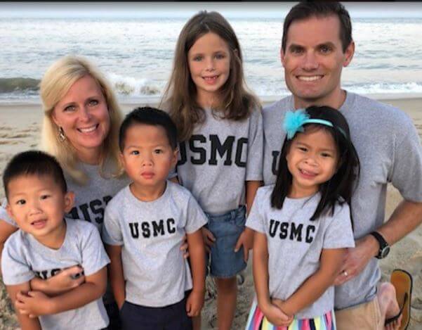 Molly Henneberg with her husband and children